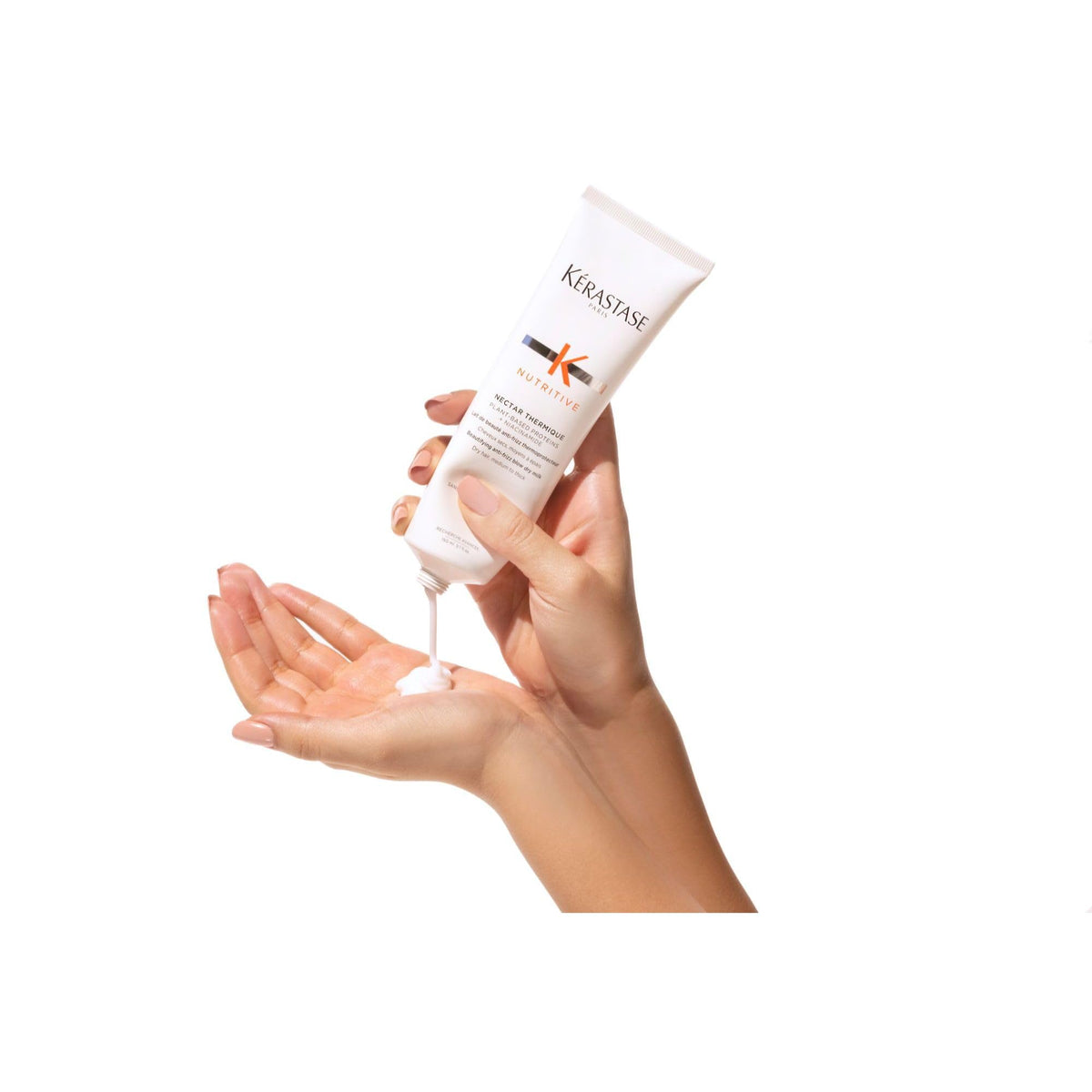 KÉRASTASE in bathroom routine lifestyle image showing everyday use and effortless styling