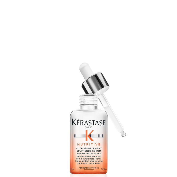 KÉRASTASE bottle front view showing product and sleek design benefit: premium presentation