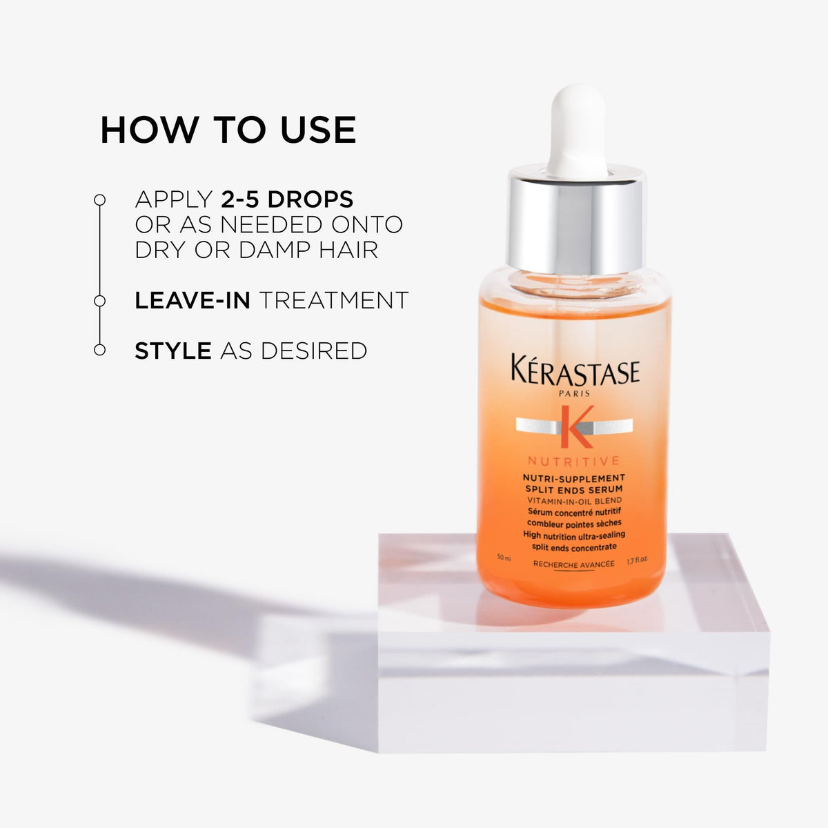 KÉRASTASE 1.7 fl oz bottle next to common object for scale benefit: portable size