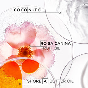 KÉRASTASE mask and hair oil beside shampoo to show routine compatibility
