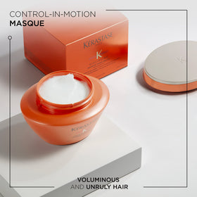 KÉRASTASE open jar close-up of creamy texture, demonstrates rich nourishing formula