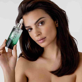 KÉRASTASE product staged in bathroom emphasizing everyday usability benefit
