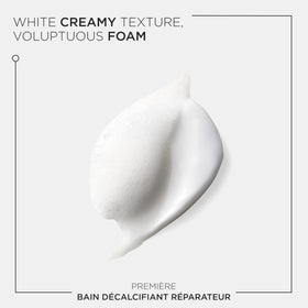KÉRASTASE shampoo in bathroom setting, suggests salon-quality daily care ritual