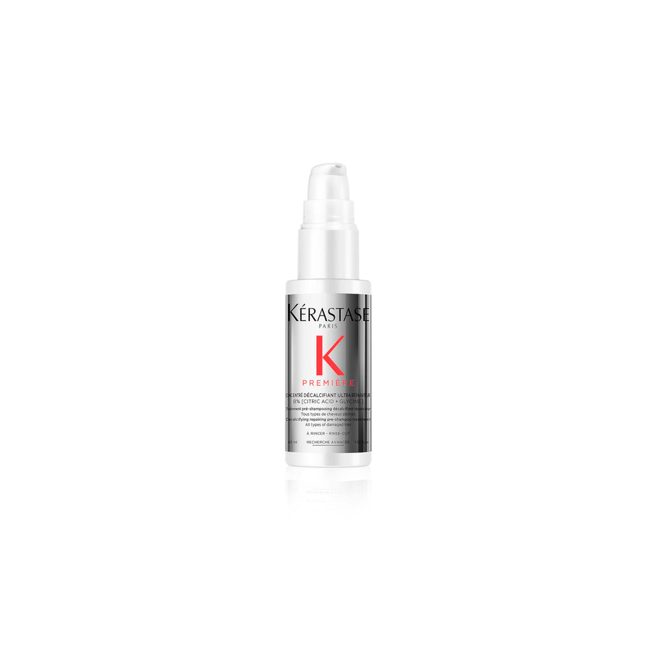 KÉRASTASE front packaging of Première Repair travel bottle showing product identity and benefit