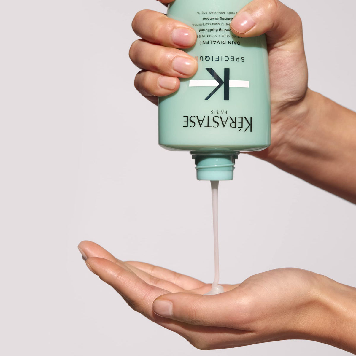 KÉRASTASE product styled with masque and serum to show complementary routine