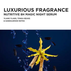 KÉRASTASE bottle beside coin showing compact size for travel-friendly nighttime care