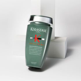KÉRASTASE shampoo in shower setting illustrating daily use routine