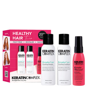 Keratin Complex front view of trio showing compact travel-friendly packaging and smoothing benefits