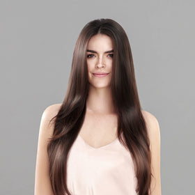 Keratin Complex shampoo in hand demonstrating gentle application benefit