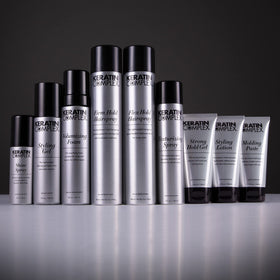 Keratin Complex lotion texture on hand demonstrating lightweight spreadability