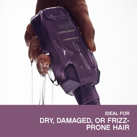 KEVIN.MURPHY held in hand to show 100 ml size and travel-friendly benefit