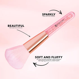 KIARA SKY brush held beside fingers to show size and precise control for detailed work