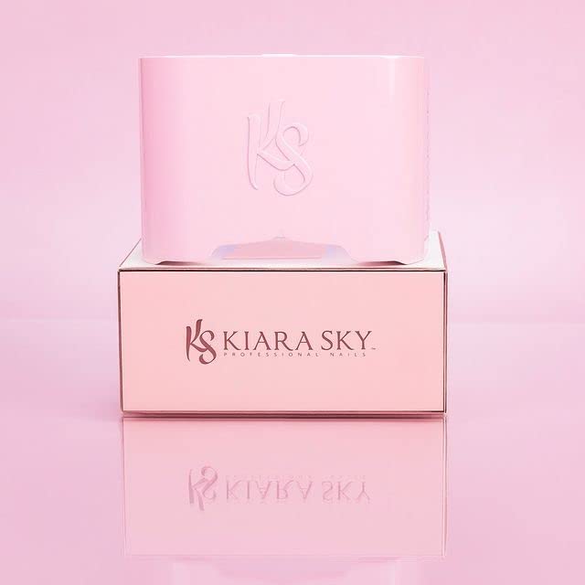 KIARA SKY lamp in travel bag beside polish showing portability and on-the-go convenience