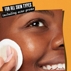 Kiehl's toner pouring texture detail showing lightweight, alcohol-free consistency