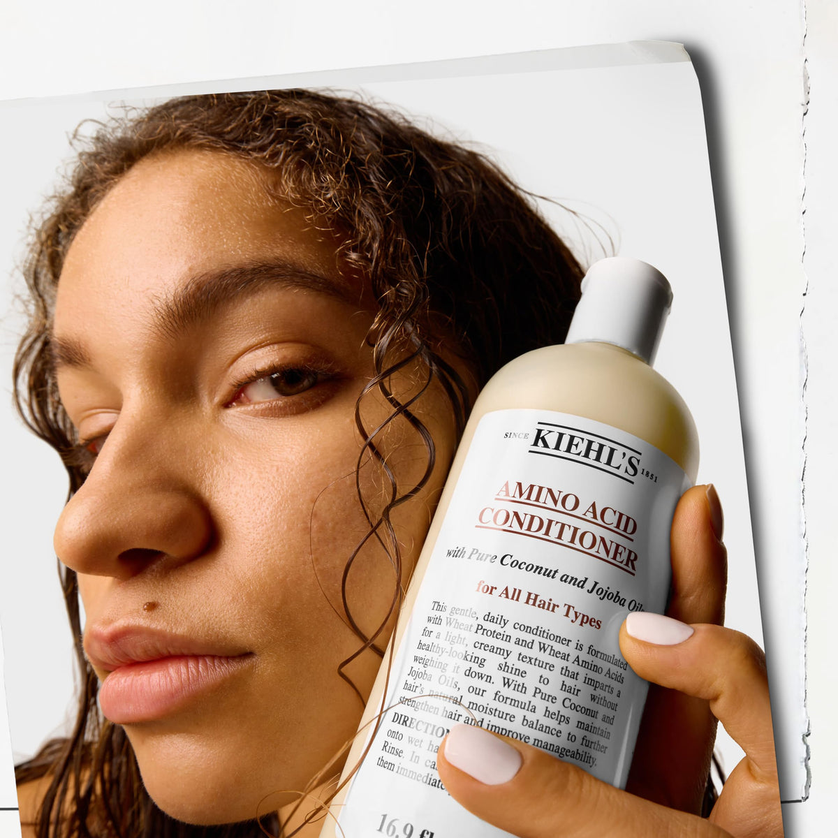 Shiny detangled hair after Kiehl's conditioner showing improved manageability