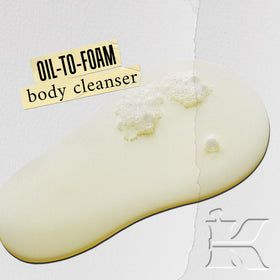 Kiehl's cleanser pouring and foaming, demonstrating easy lather and cleansing benefit