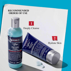 Kiehl's products in hand for size comparison and easy travel benefit