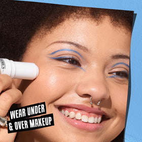 Kiehl's balm applied under makeup demonstrating layered wear and smoothing benefit