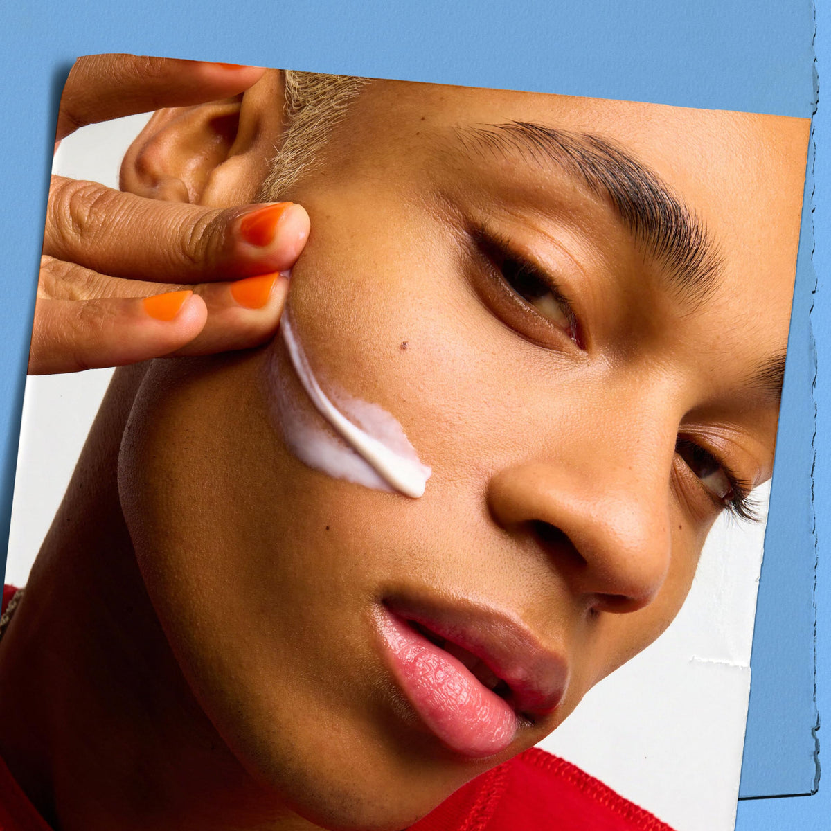 Kiehl's moisturizer being dispensed onto finger for easy daily application