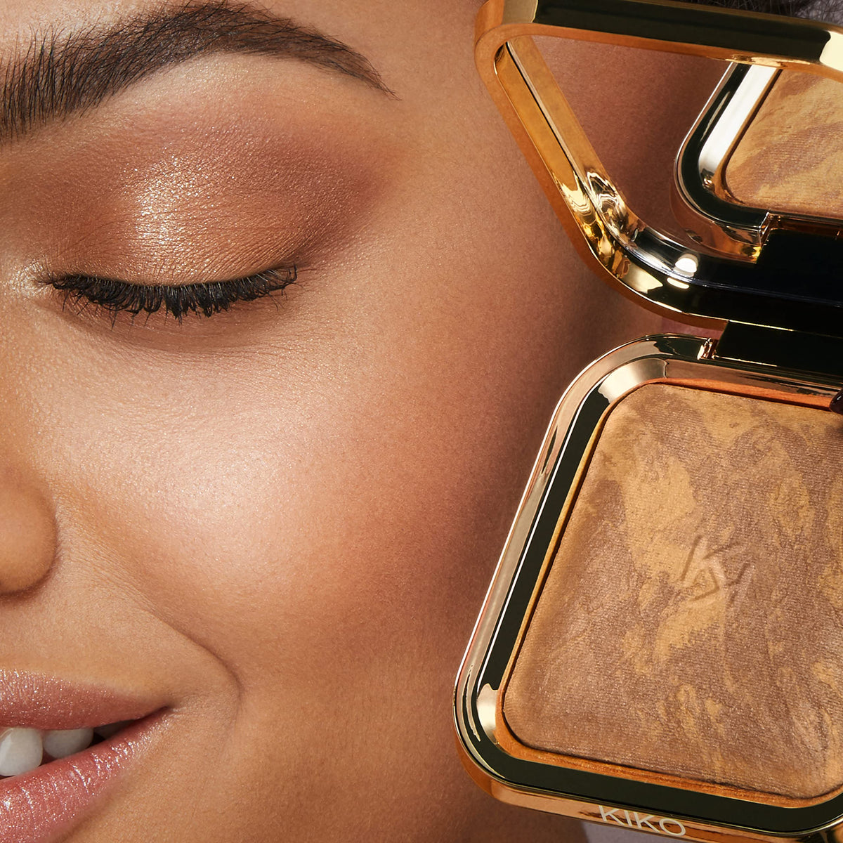 KIKO Milano bronzer in use applied with brush for natural sun-kissed warmth benefit