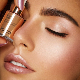 KIKO Milano product being dabbed on cheekbone demonstrating blendable glow