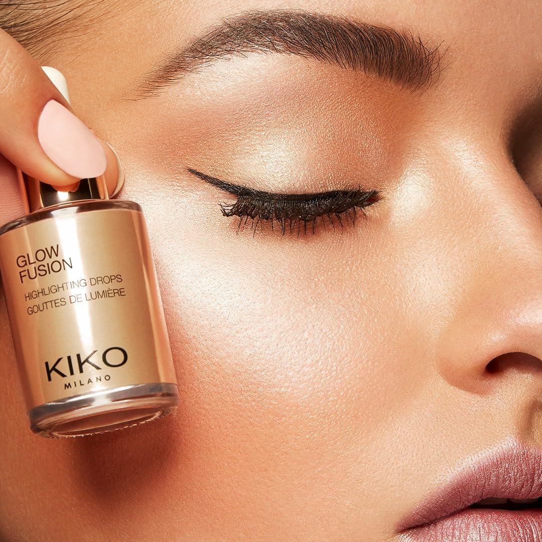 KIKO Milano bottle beside coin to show size and portability benefit