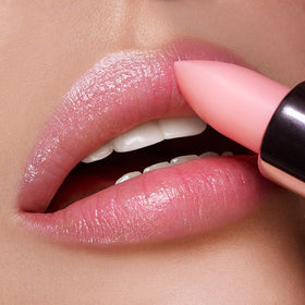 Kiko Milano lipstick worn by model in lifestyle scene showing natural pink radiance