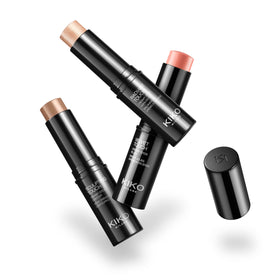 KIKO Milano sticks in hand to show compact size and pocket-friendly convenience