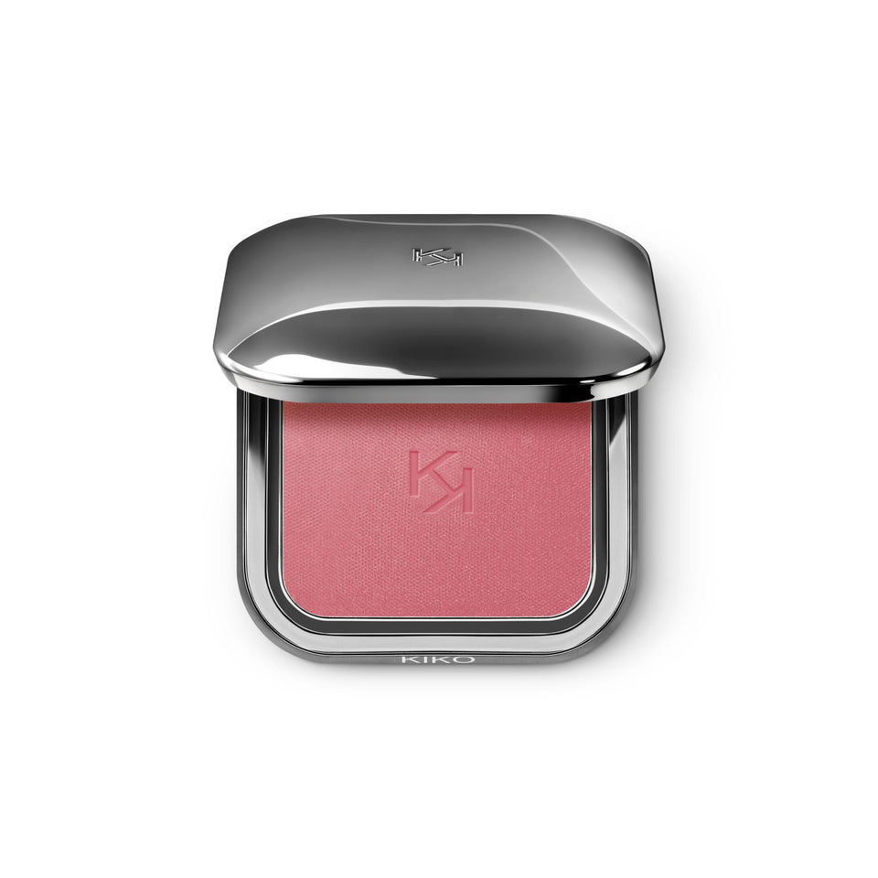 KIKO Milano compact front view showing sleek gunmetal case and KK branding, premium portability