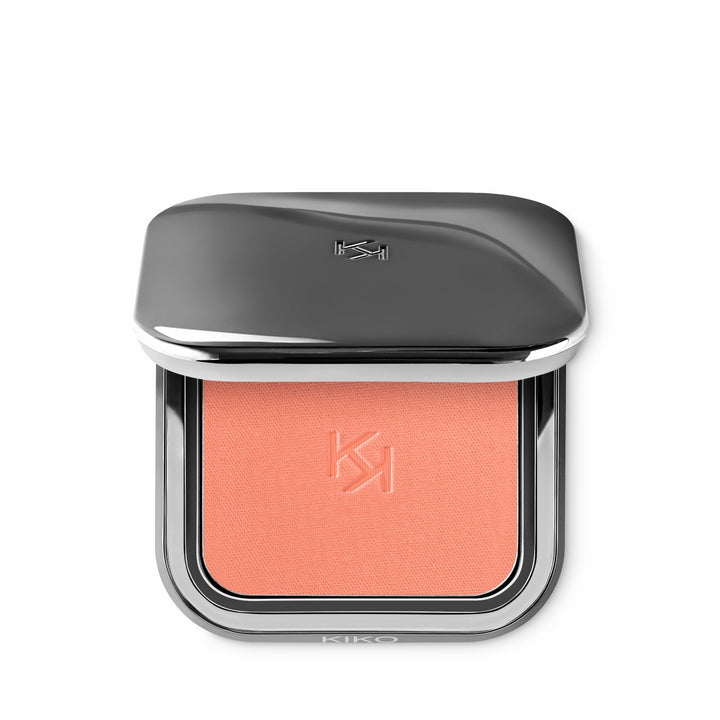 KIKO Milano compact front view showing sleek gunmetal case and mirror for travel convenience