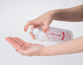 Kikumasamune bottle next to common objects showing 500mL scale