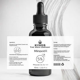Kings The Hair Company bottle held in hand to show 60ml scale and portability benefit