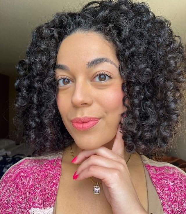 Kinky Curly shampoo texture close-up demonstrating creamy clarifying lather
