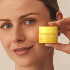 Kinship Brightwave staged in bathroom routine showing daily-use convenience