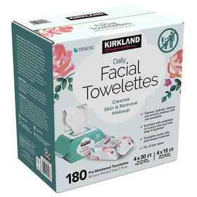 Hand using Kirkland Signature towelette for makeup removal demonstrating quick cleansing benefit