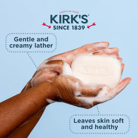 Kirk's soap bars next to a ruler to show 4 oz size and family value pack