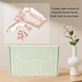 KISMETICS sleep set styled on a bed showing cohesive look and bedtime routine benefit