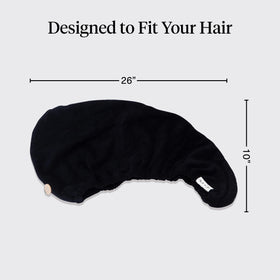 Kitsch model with long hair wearing towel wrap for quicker drying