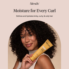 Kitsch lifestyle image of woman with defined, touchable curls