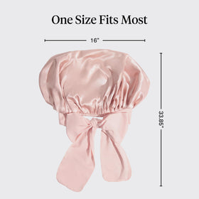 Kitsch model sleeping wearing bonnet to reduce frizz