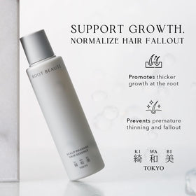 Kiwabi rollerball applicator close-up enabling precise, mess-free scalp targeting