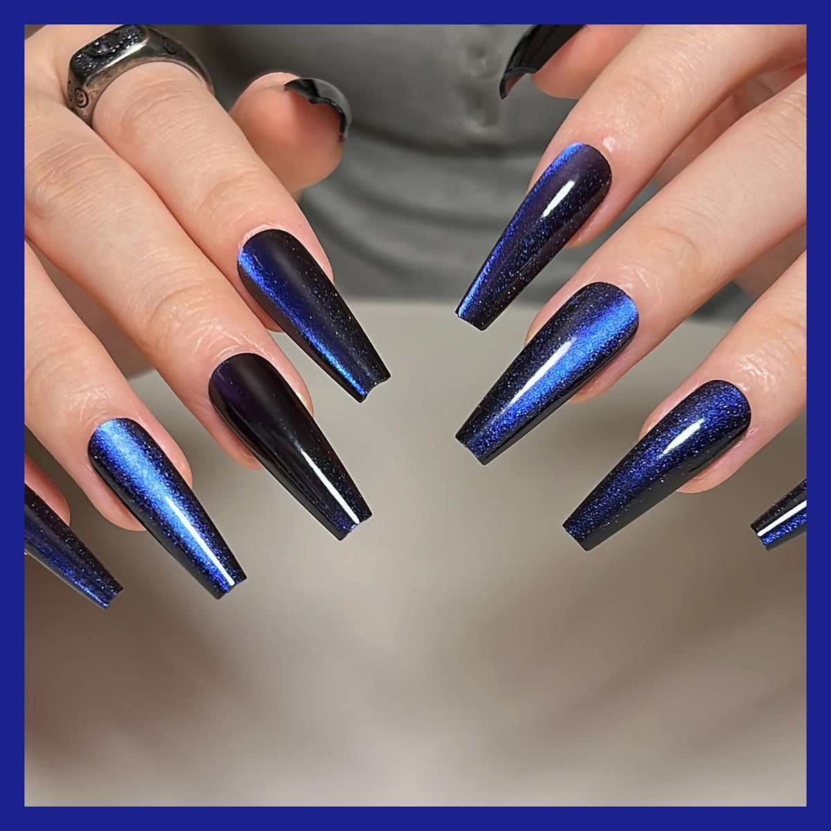 KKUUOO hand applying press-on nail for fast salon look