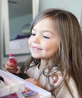 Klee Naturals gloss applied on lips demonstrating subtle tint and natural-looking color