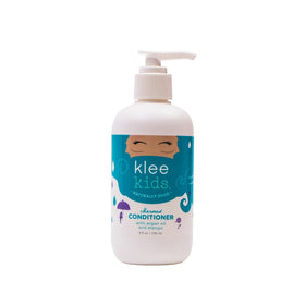 Klee Naturals conditioner cream close-up illustrating smooth detangling benefit