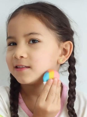 Klee Naturals lip shimmer tube displayed for easy, kid-friendly application benefit