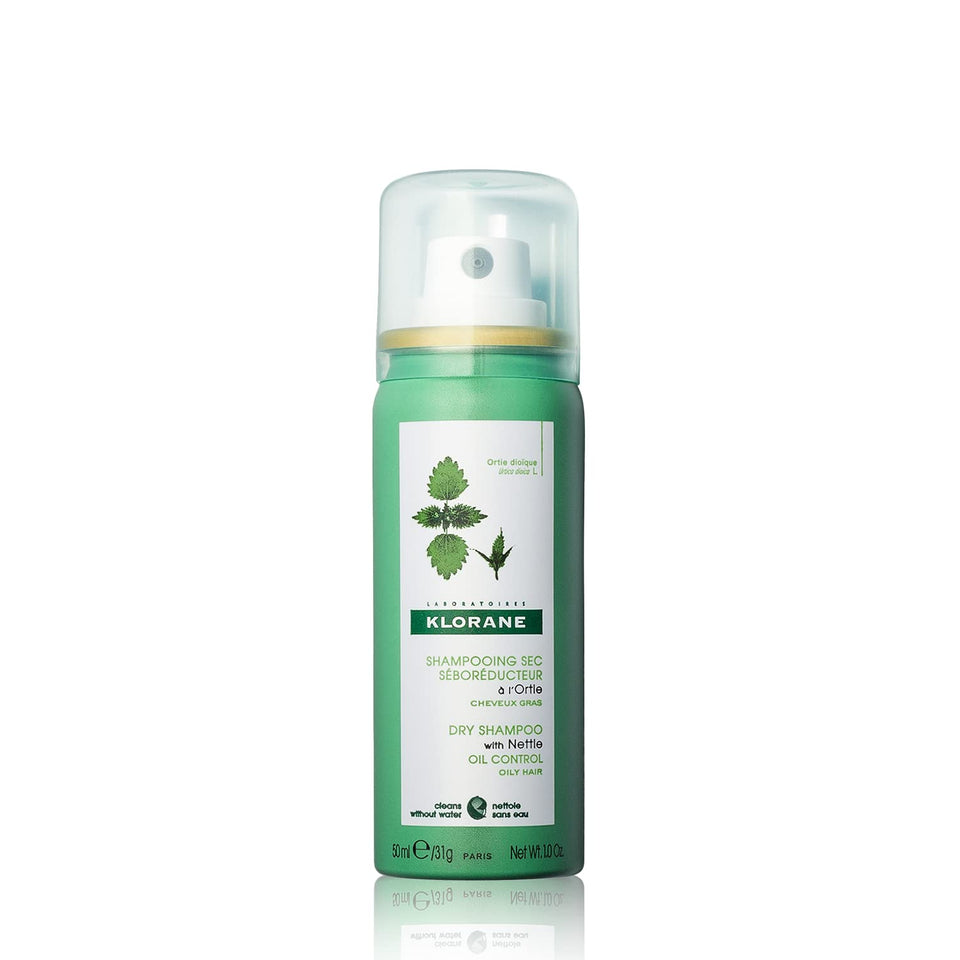 Klorane front packaging of travel-size nettle dry shampoo shows compact convenience