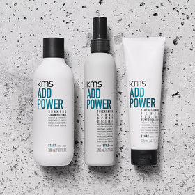 KMS ADDPOWER bottle beside ruler showing 10.14 fl oz size for accurate scale