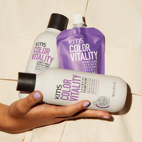 KMS bottle on bathroom shelf illustrating daily color-care routine benefit