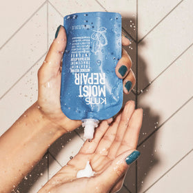 KMS MoistRepair in-shower application on towel-dried hair for repair
