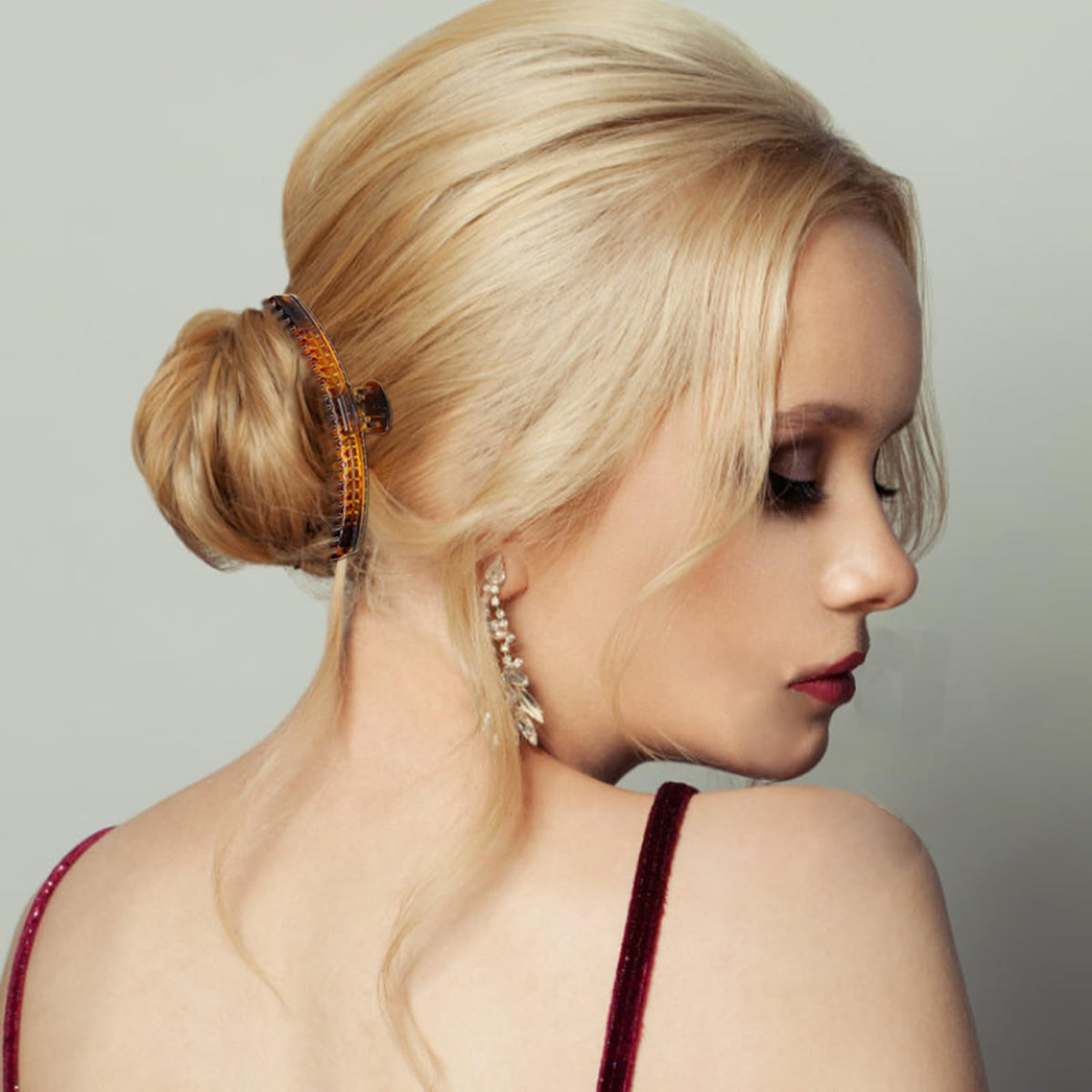 Koceci clips in use holding an updo showing reliable everyday styling
